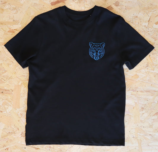 Black t-shirt with a blue bear logo on a wooden surface