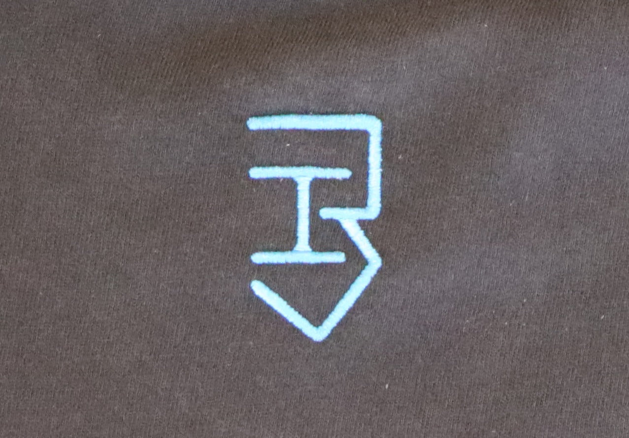 blue logo on a black t-shirt 